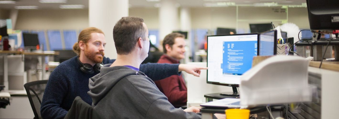 marketers working at cubicle